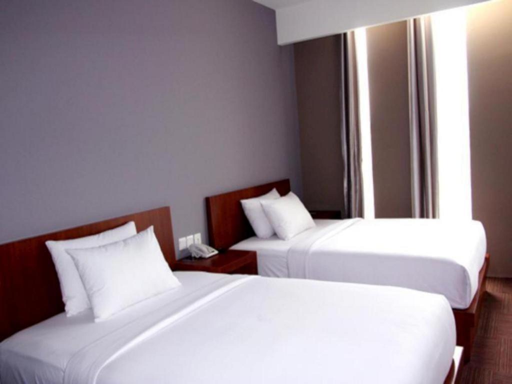 Plan B Hotel Паданг Екстериор снимка